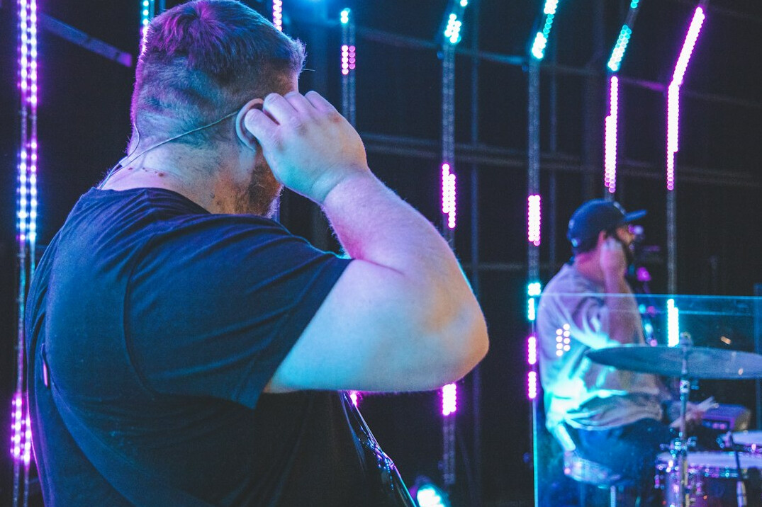 Host receiving guidance through an earpiece during live broadcast